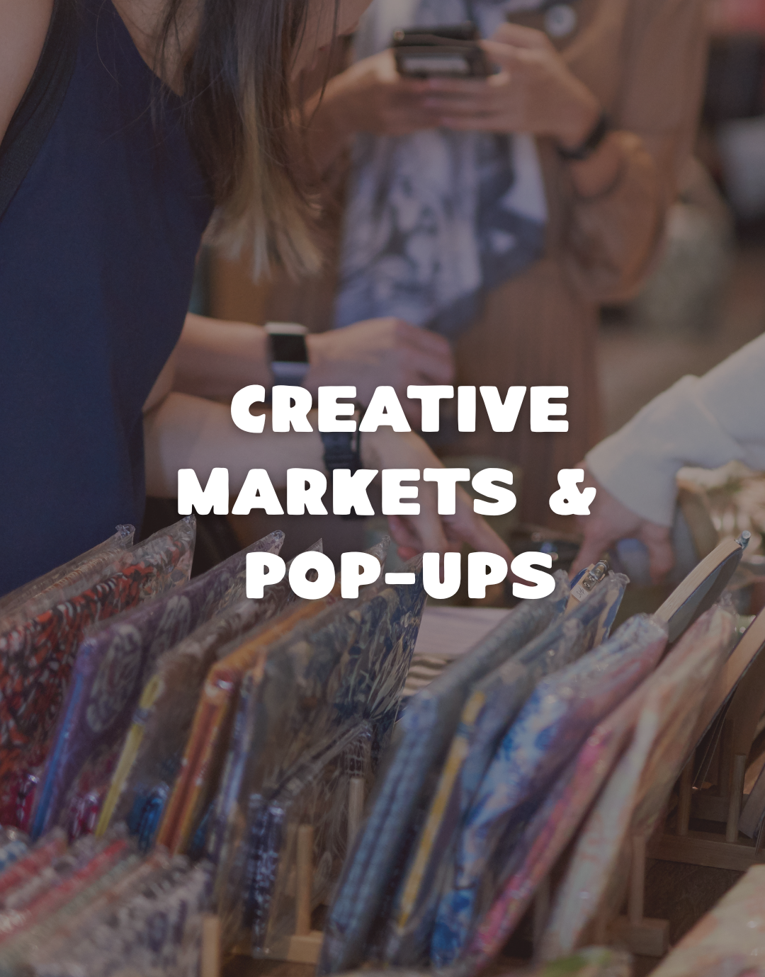 People shopping at a market with text overlay 'Creative Markets & Pop-Ups'.