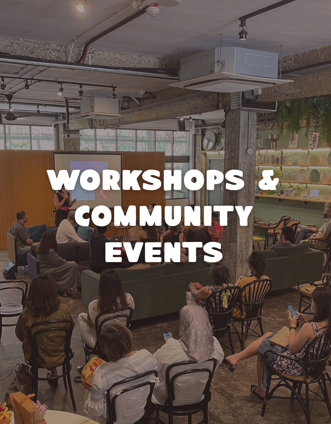 An image showcasing people attending a workshop or community event with an overlay text 'Workshop & Community Events'